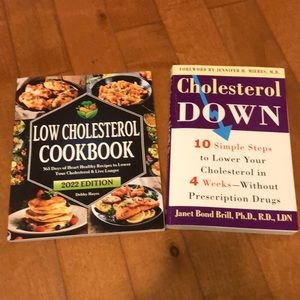 Set of Two Paperback Books on Lowering Cholesterol